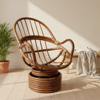 Fauteuil à bascule pivotant en rotin avec coussin en micro-suède
