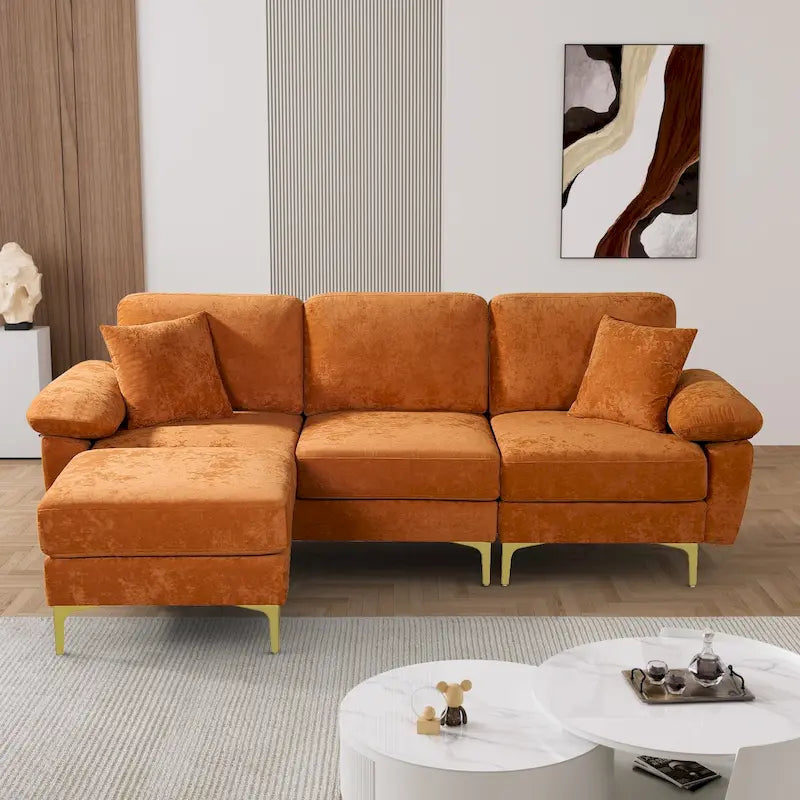 Canapé d'angle rembourré en velours avec oreillers et pouf