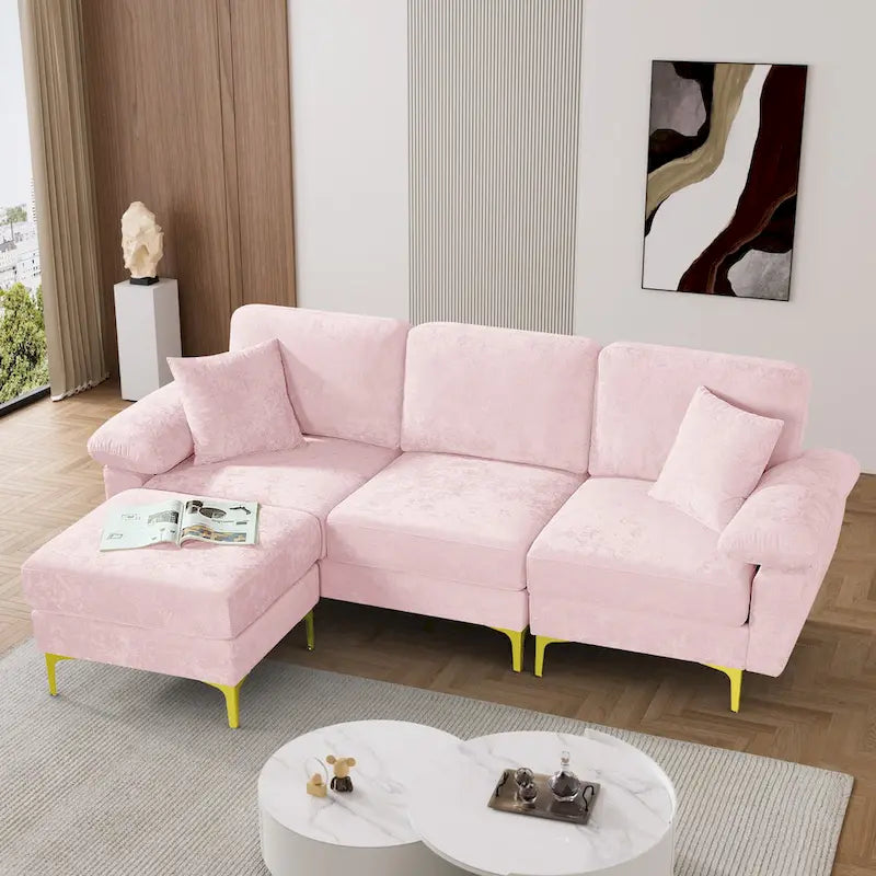 Canapé d'angle rembourré en velours avec oreillers et pouf