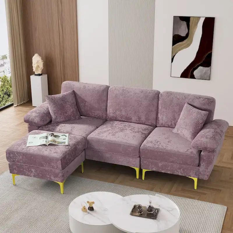 Canapé d'angle rembourré en velours avec oreillers et pouf