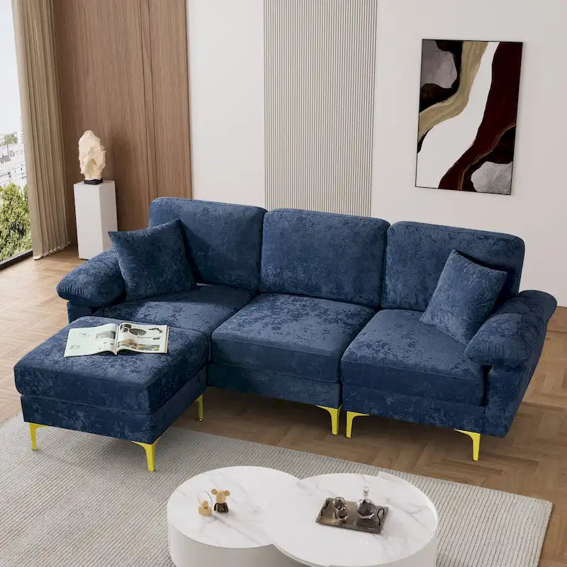 Canapé d'angle rembourré en velours avec oreillers et pouf