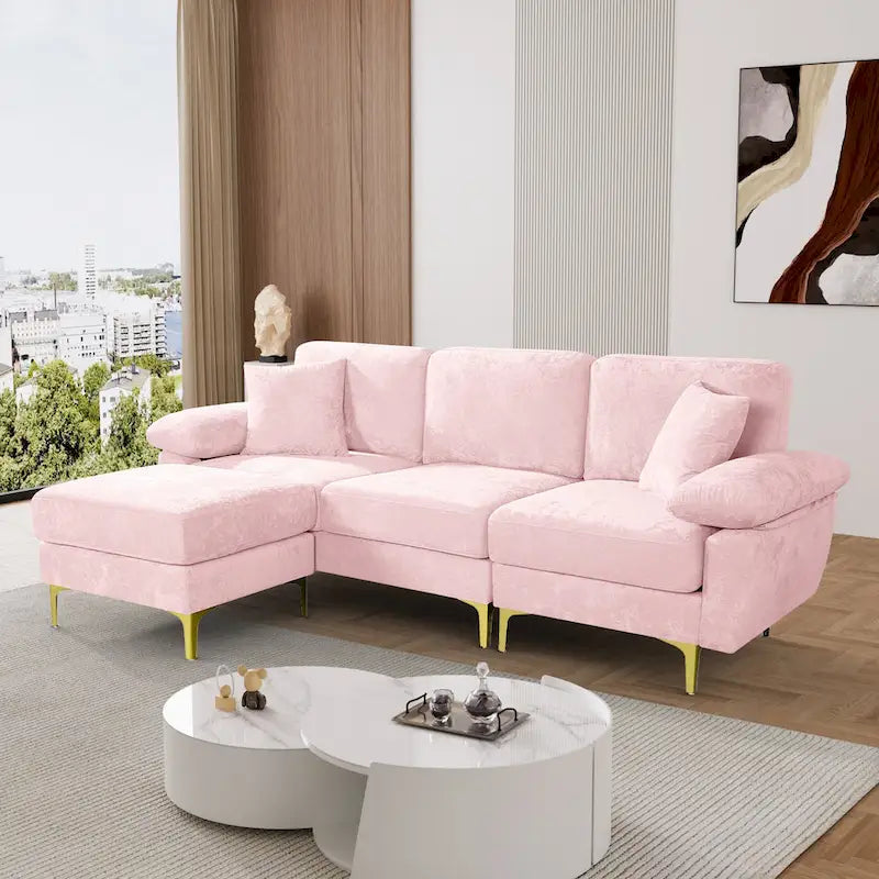 Canapé d'angle rembourré en velours avec oreillers et pouf